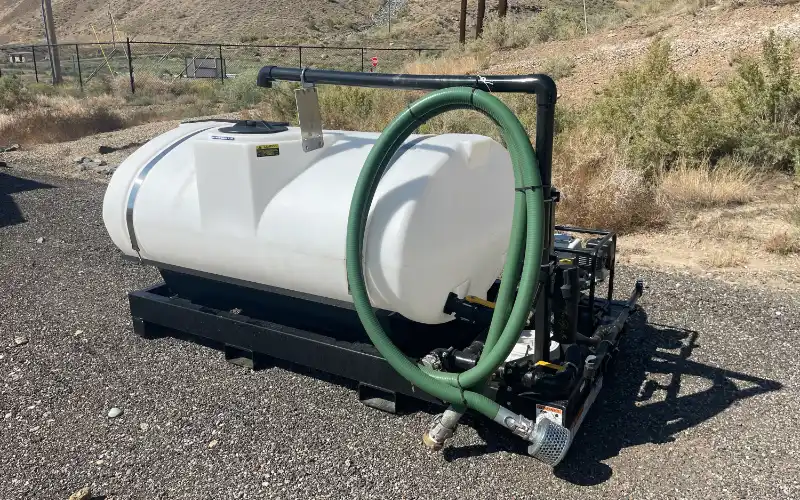 Elliptical skid sprayer mounted on heavy-duty frame