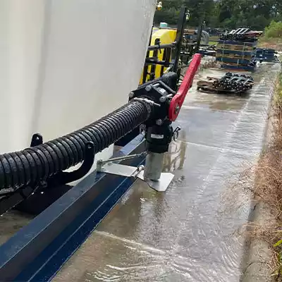 Rear sprayer with a hose