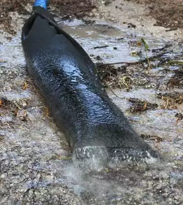 dewatering filter sock in use