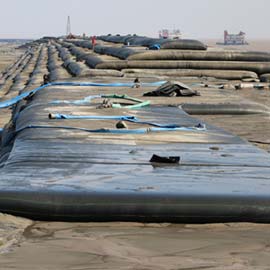 dewatering tubes on a beach