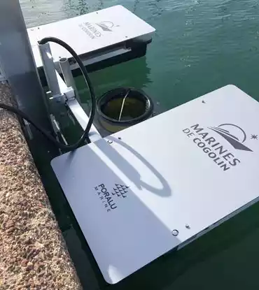 seabin fixed to marina walkway