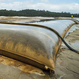 dewatering tubes on a beach