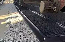 Close up photo of the Pellet Pan installed on a rail line